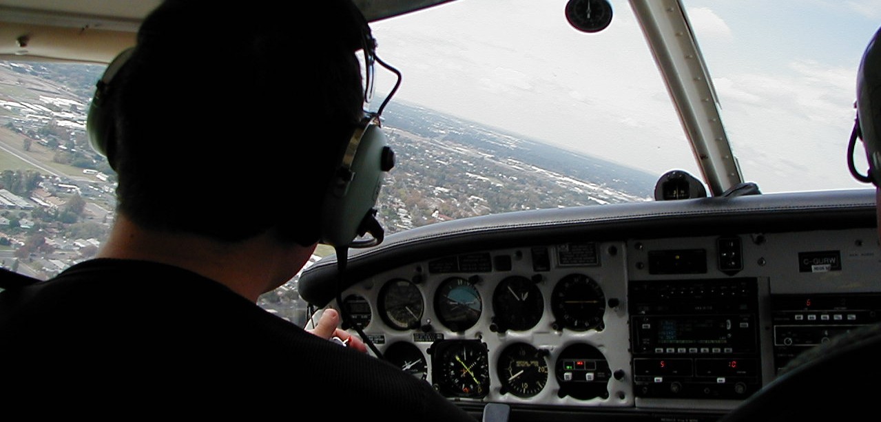 Justin Chung maneuvering for landing at Fresno-Chandler Airport, Langley Flying School